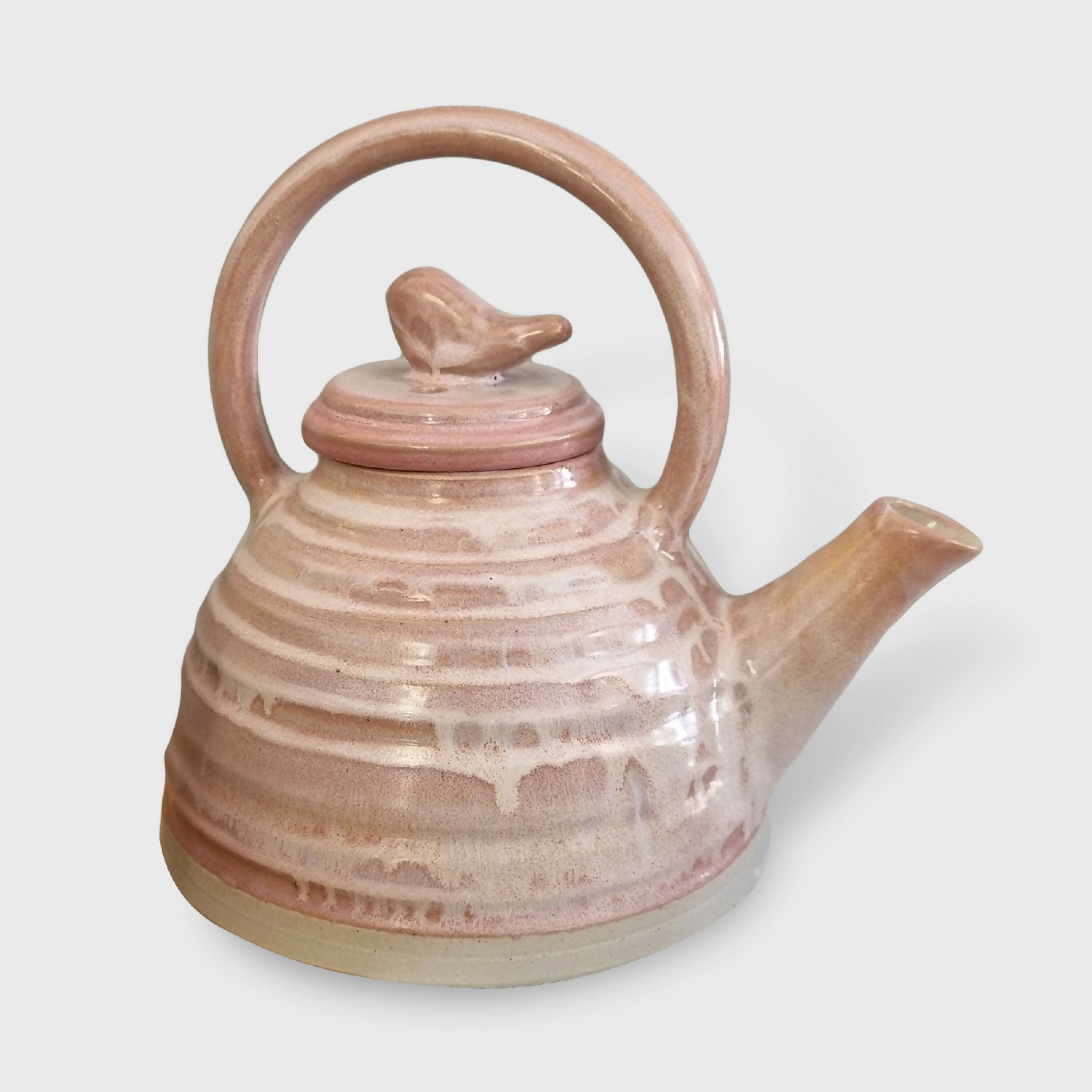 Théière rose à l