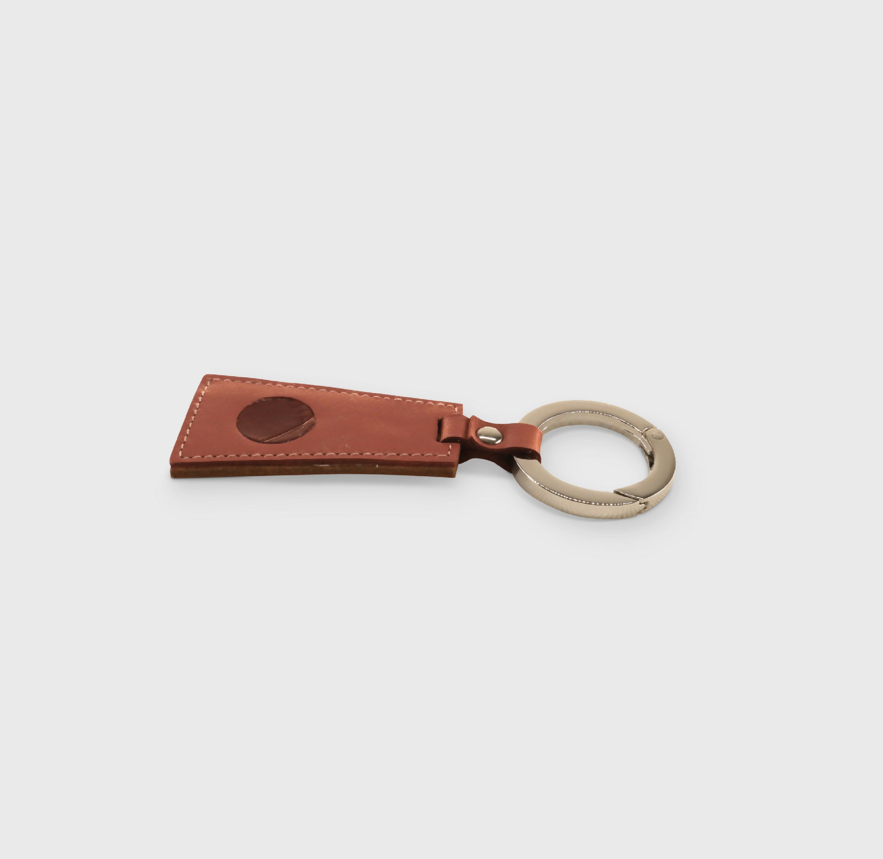 porte_cle_pennant_en_cuir_version_n°2–_terre_de_sienne_et_vigne_sylvie_strohl | EMPREINTES Paris