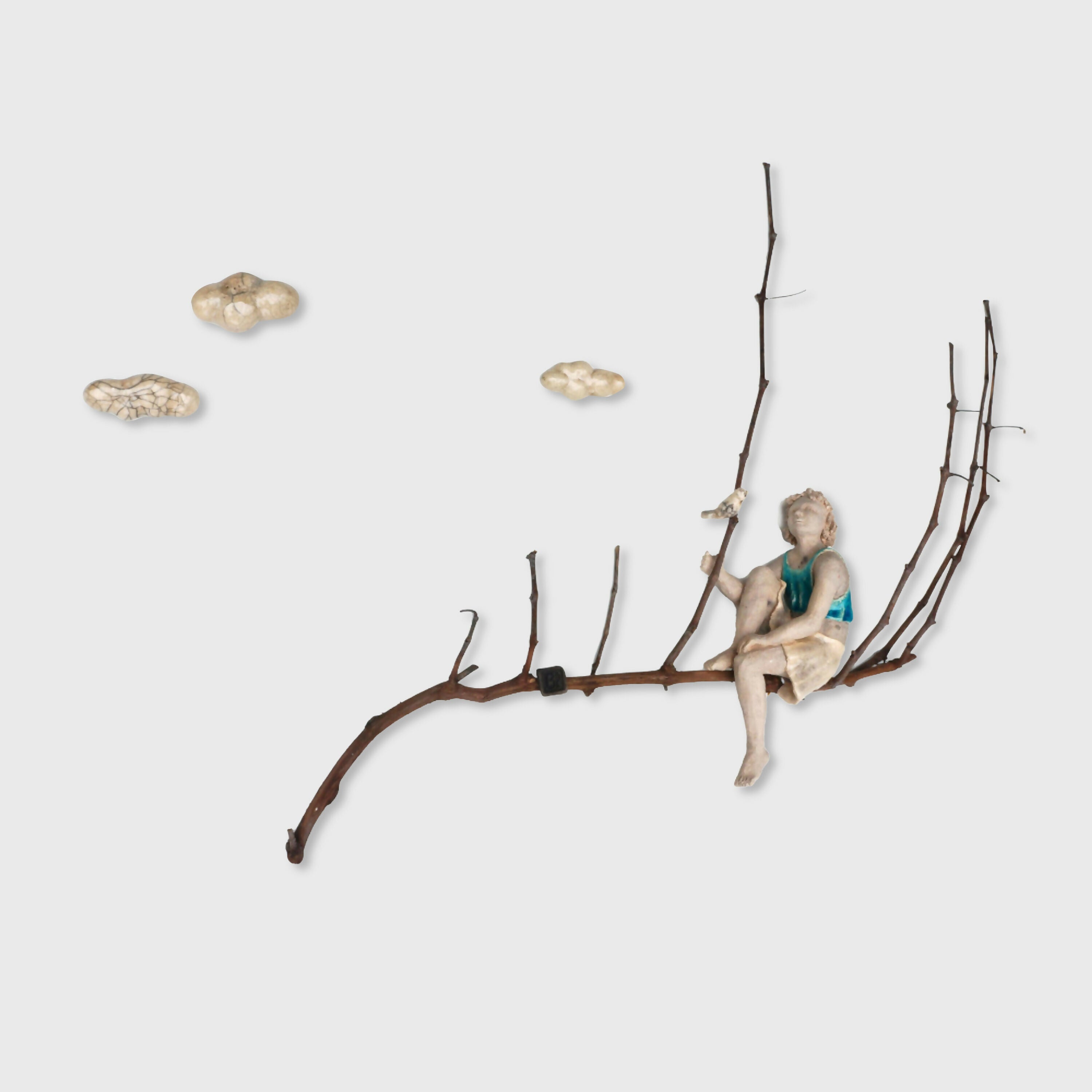 Sculpture personnage sur branche REVERIE | EMPREINTES Paris