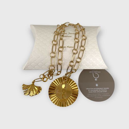 Sautoir rayons dorés motif bouddha blanc | EMPREINTES Paris - EMPREINTES Paris