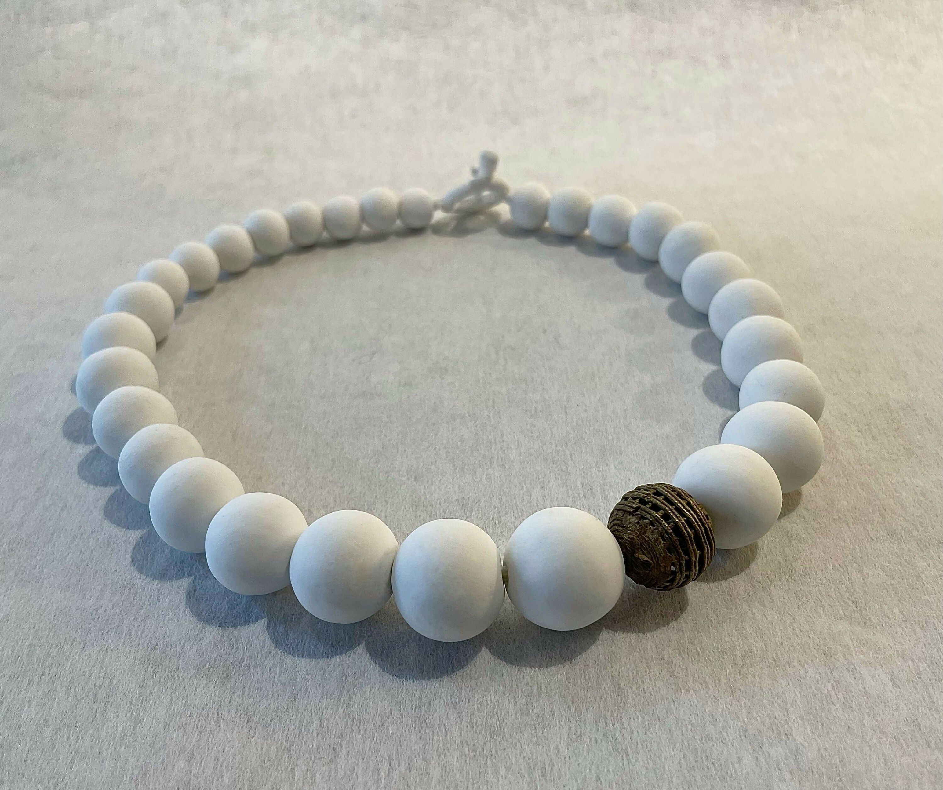 Collier - Une perle en bronze | EMPREINTES Paris