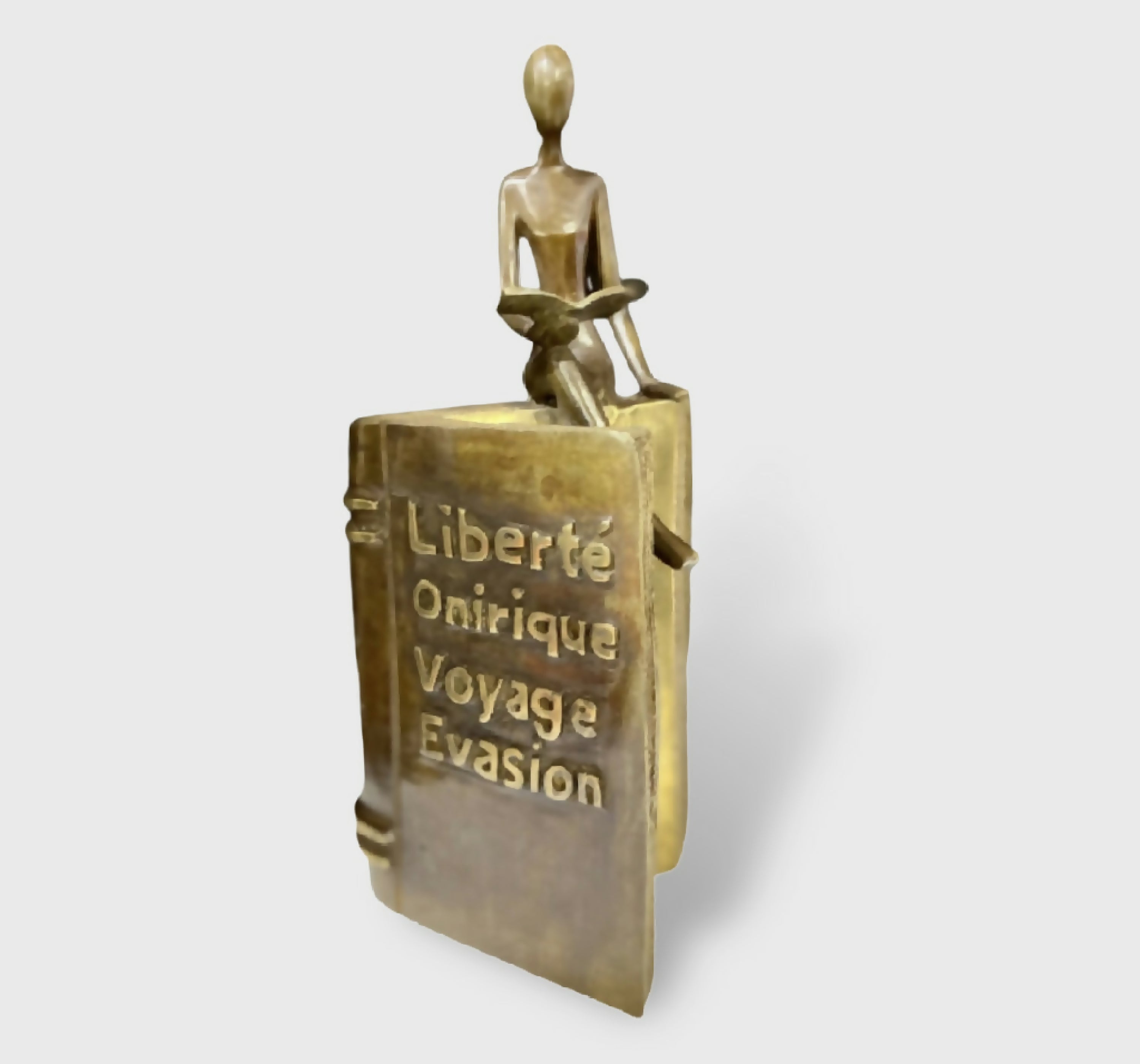 sculpture_bronze_carl_jaunais_lectrice_assise_bord_de_livre_carl_jaunay_reanimateur_dobjets copie | EMPREINTES Paris