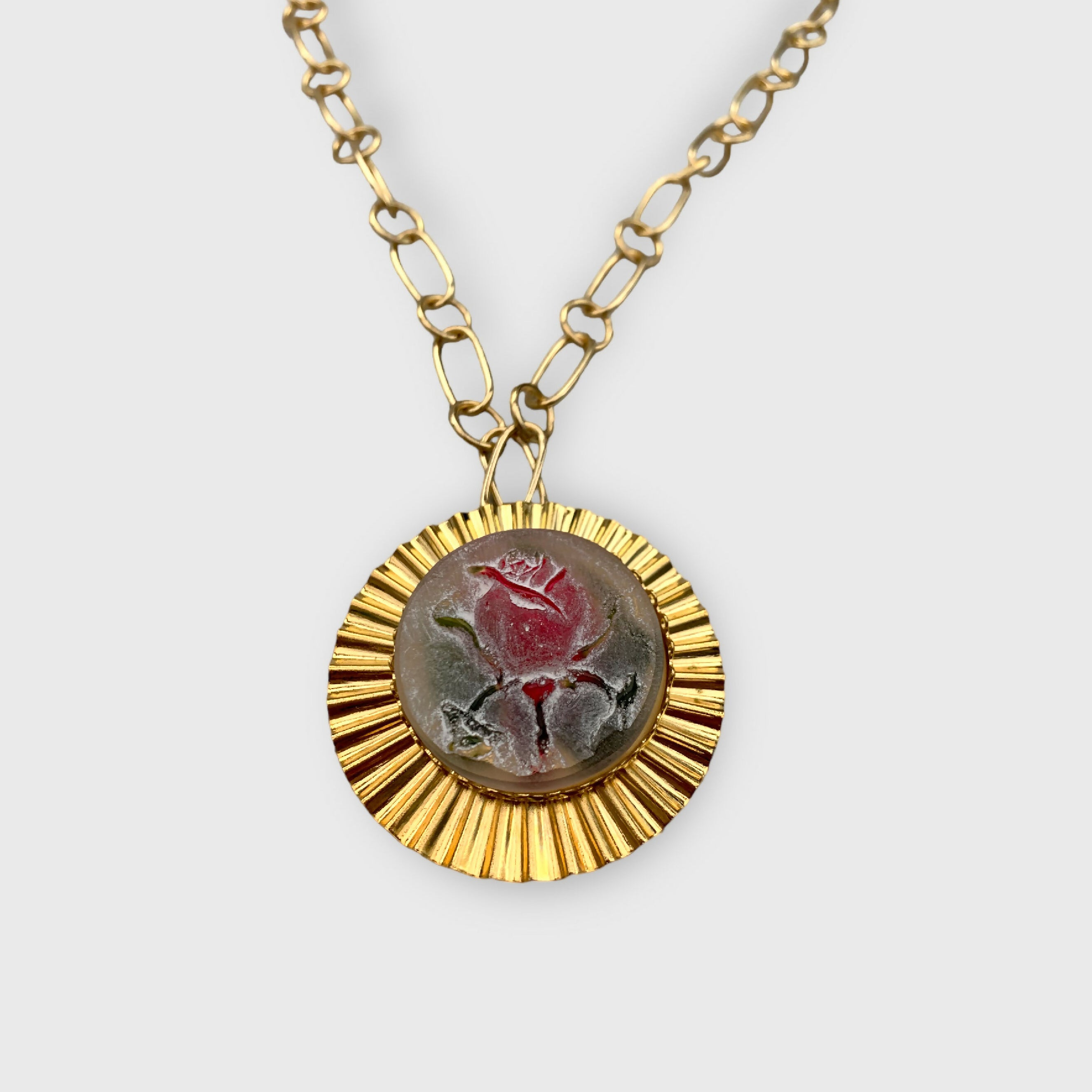 Sautoir rayon doré motif d