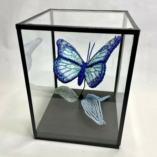 papillon_bleu_sur_feuilles_agathe_you copie | EMPREINTES Paris - EMPREINTES Paris