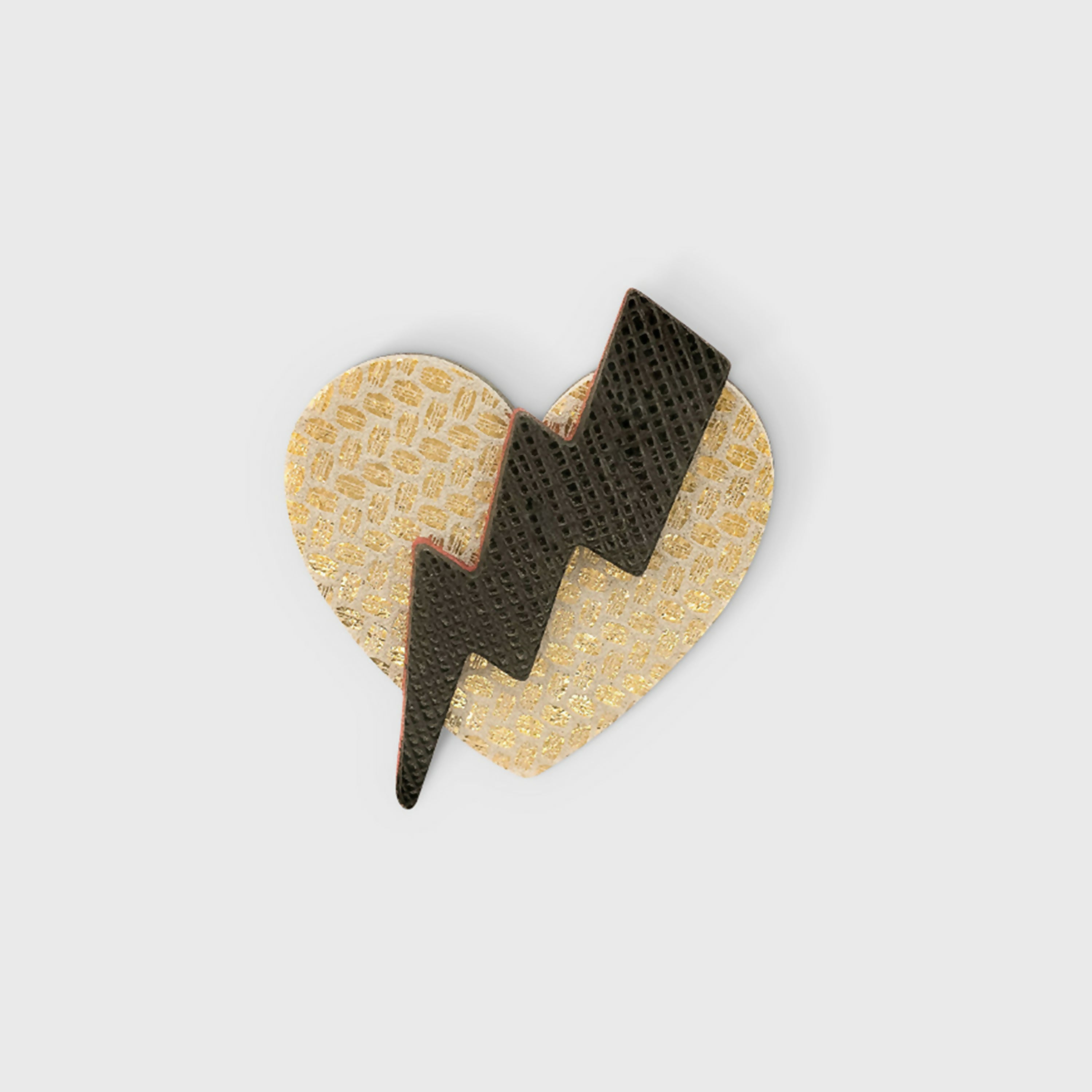 broche_coup_de_foudre_en_cuir_couleur_or_et_noir_julie_troncin_maroquinerie | EMPREINTES Paris