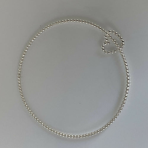 bracelet_jonc_en_argent_massif_et_sa_breloque_coeur_en_fil_perle_artyssia | EMPREINTES Paris - EMPREINTES Paris