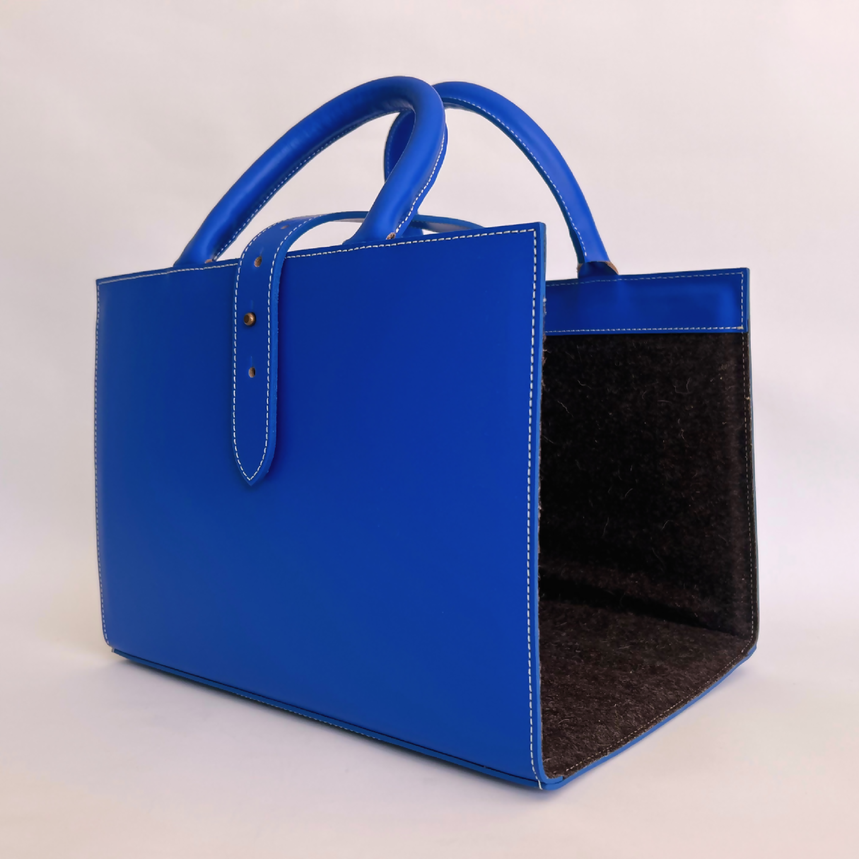 porte_revues_en_cuir_bleu_mediterranee_midipy copie | EMPREINTES Paris