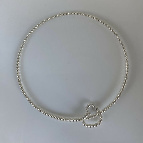 bracelet_jonc_en_argent_massif_et_sa_breloque_coeur_en_fil_perle_artyssia | EMPREINTES Paris - EMPREINTES Paris