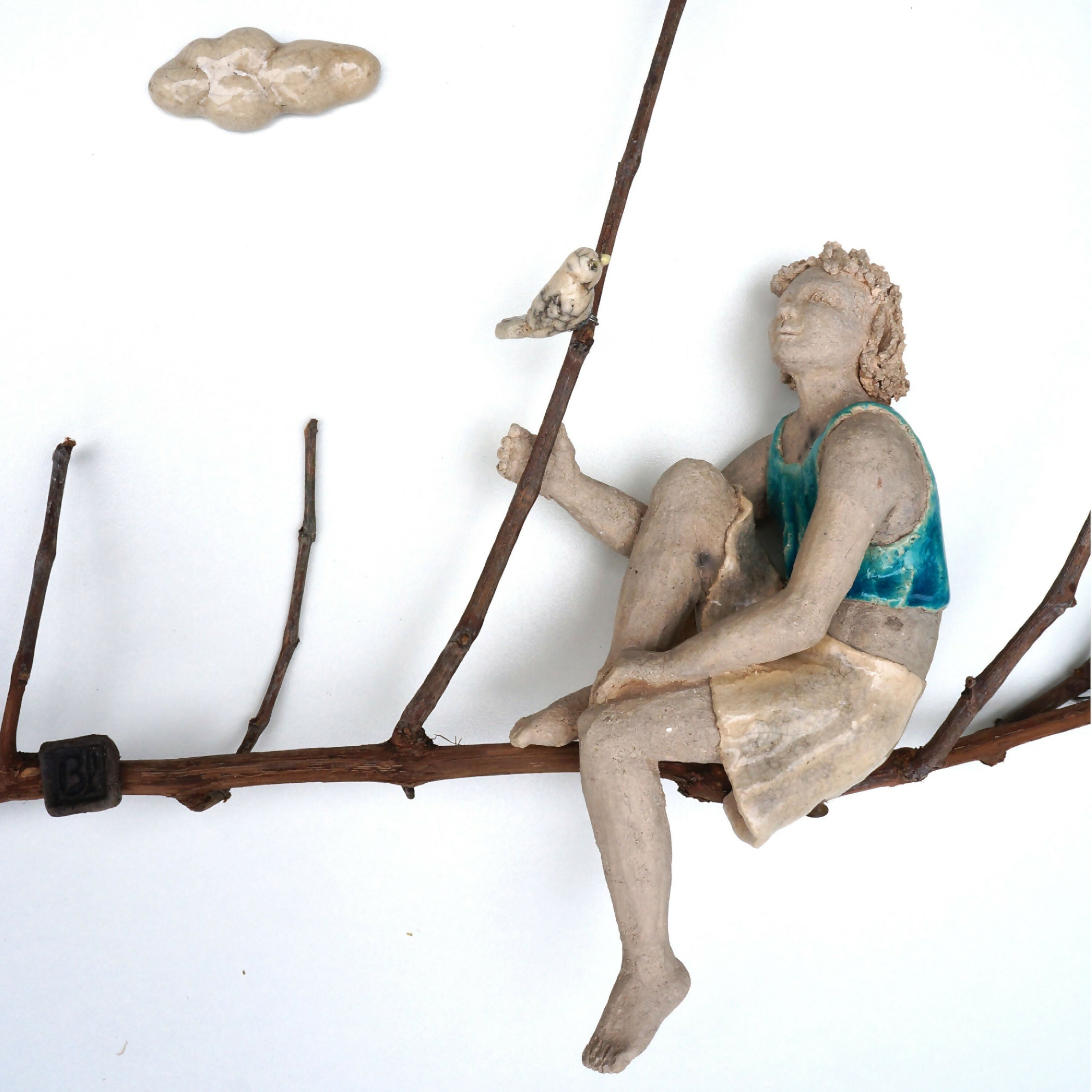Sculpture personnage sur branche REVERIE | EMPREINTES Paris
