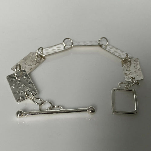 Bracelet en argent massif martelé, motif spirales | EMPREINTES Paris - EMPREINTES Paris