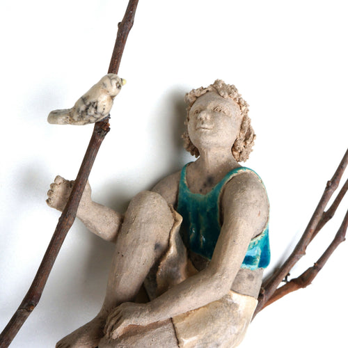 Sculpture personnage sur branche REVERIE | EMPREINTES Paris - EMPREINTES Paris