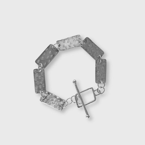 Bracelet en argent massif martelé, motif spirales | EMPREINTES Paris - EMPREINTES Paris