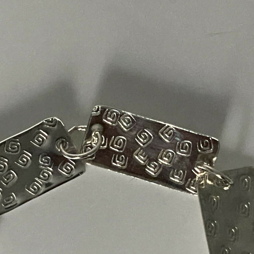 Bracelet en argent massif martelé, motif spirales | EMPREINTES Paris - EMPREINTES Paris