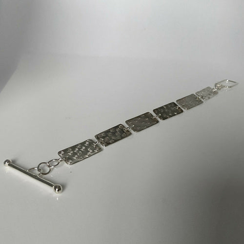 Bracelet en argent massif martelé, motif spirales | EMPREINTES Paris - EMPREINTES Paris