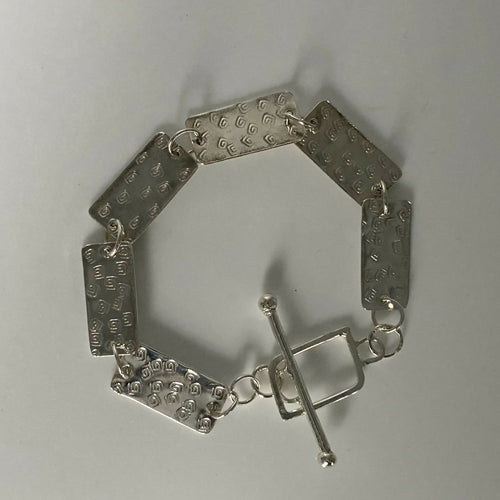 Bracelet en argent massif martelé, motif spirales | EMPREINTES Paris - EMPREINTES Paris