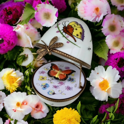 Oeuf musical blanc decor papillon orange | EMPREINTES Paris - EMPREINTES Paris