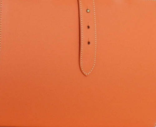 Porte-revues en cuir orange | EMPREINTES Paris - EMPREINTES Paris