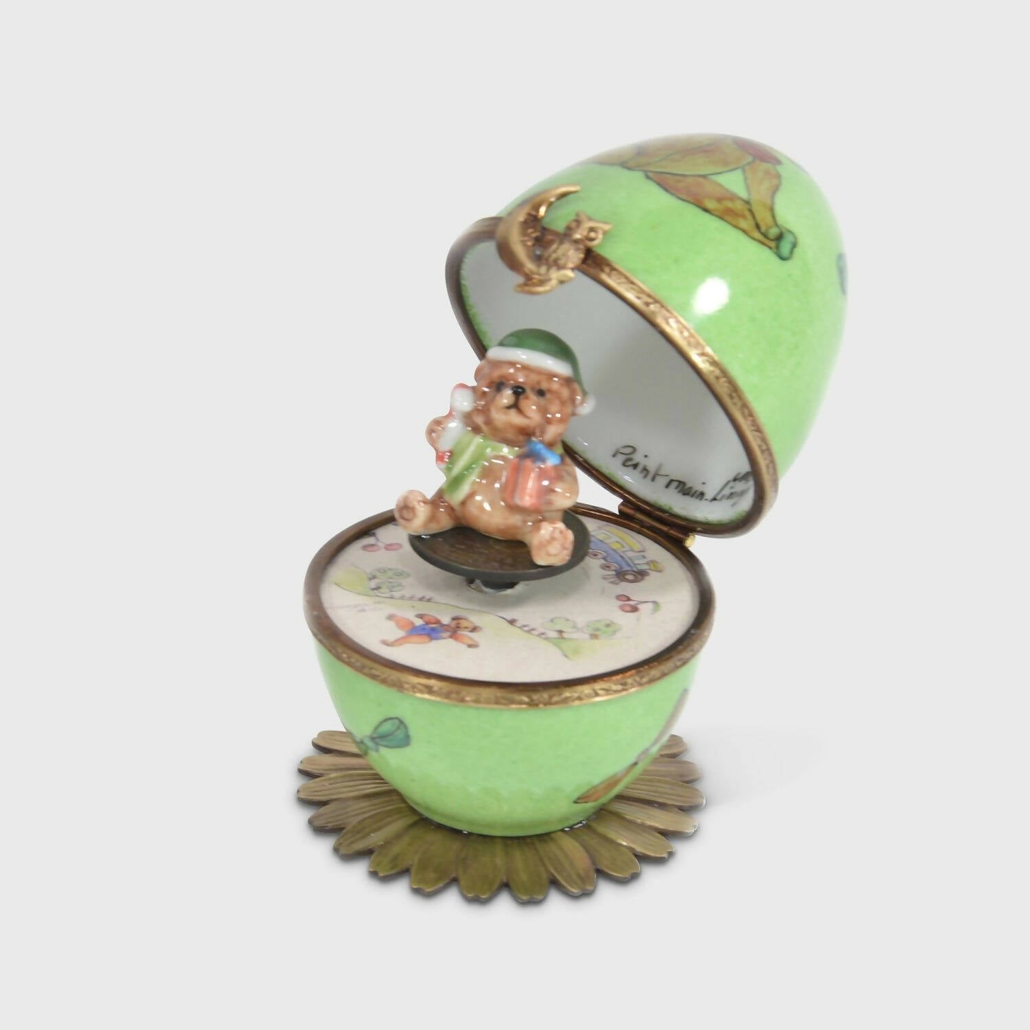 Œuf musical vert ourson brun et ourson jouets | EMPREINTES Paris