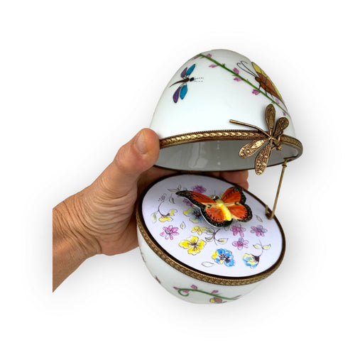 Oeuf musical blanc decor papillon orange | EMPREINTES Paris - EMPREINTES Paris