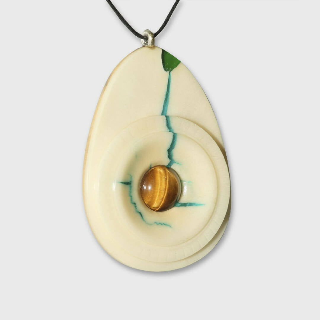 Pendentif ivoire végétal et oeil de tigre | EMPREINTES Paris