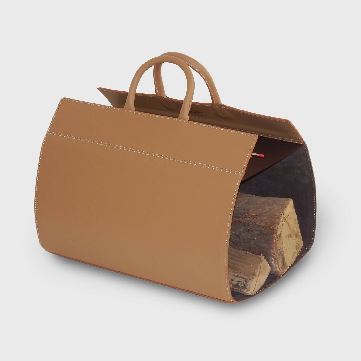 Porte bûches en cuir Camel | EMPREINTES Paris