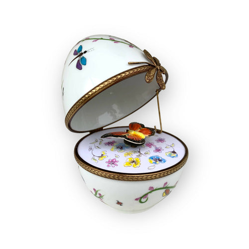 Oeuf musical blanc decor papillon orange | EMPREINTES Paris - EMPREINTES Paris
