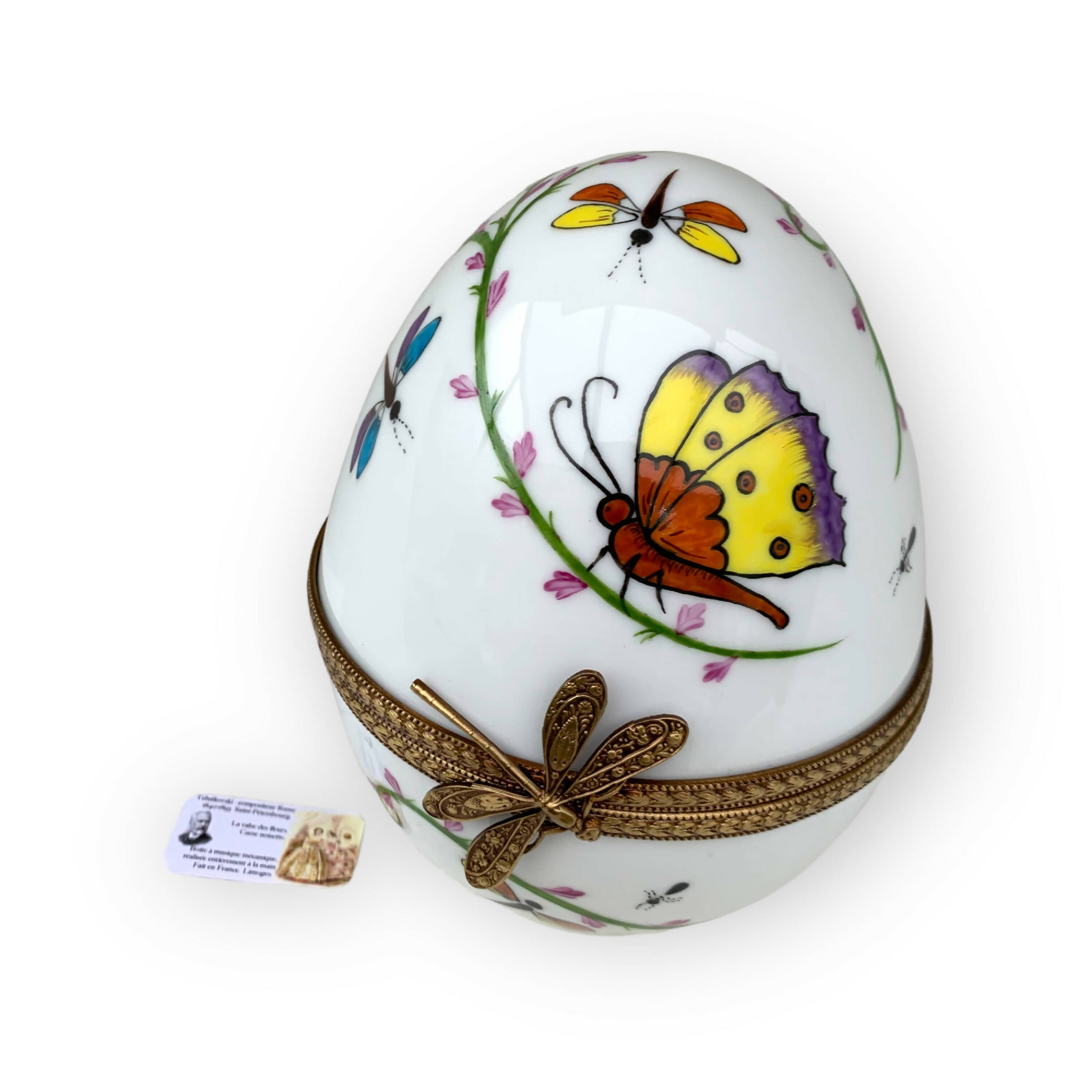 Oeuf musical blanc decor papillon orange | EMPREINTES Paris