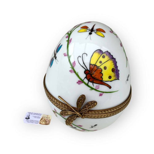 Oeuf musical blanc decor papillon orange | EMPREINTES Paris - EMPREINTES Paris