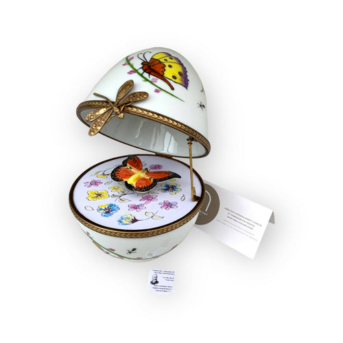Oeuf musical blanc decor papillon orange | EMPREINTES Paris - EMPREINTES Paris