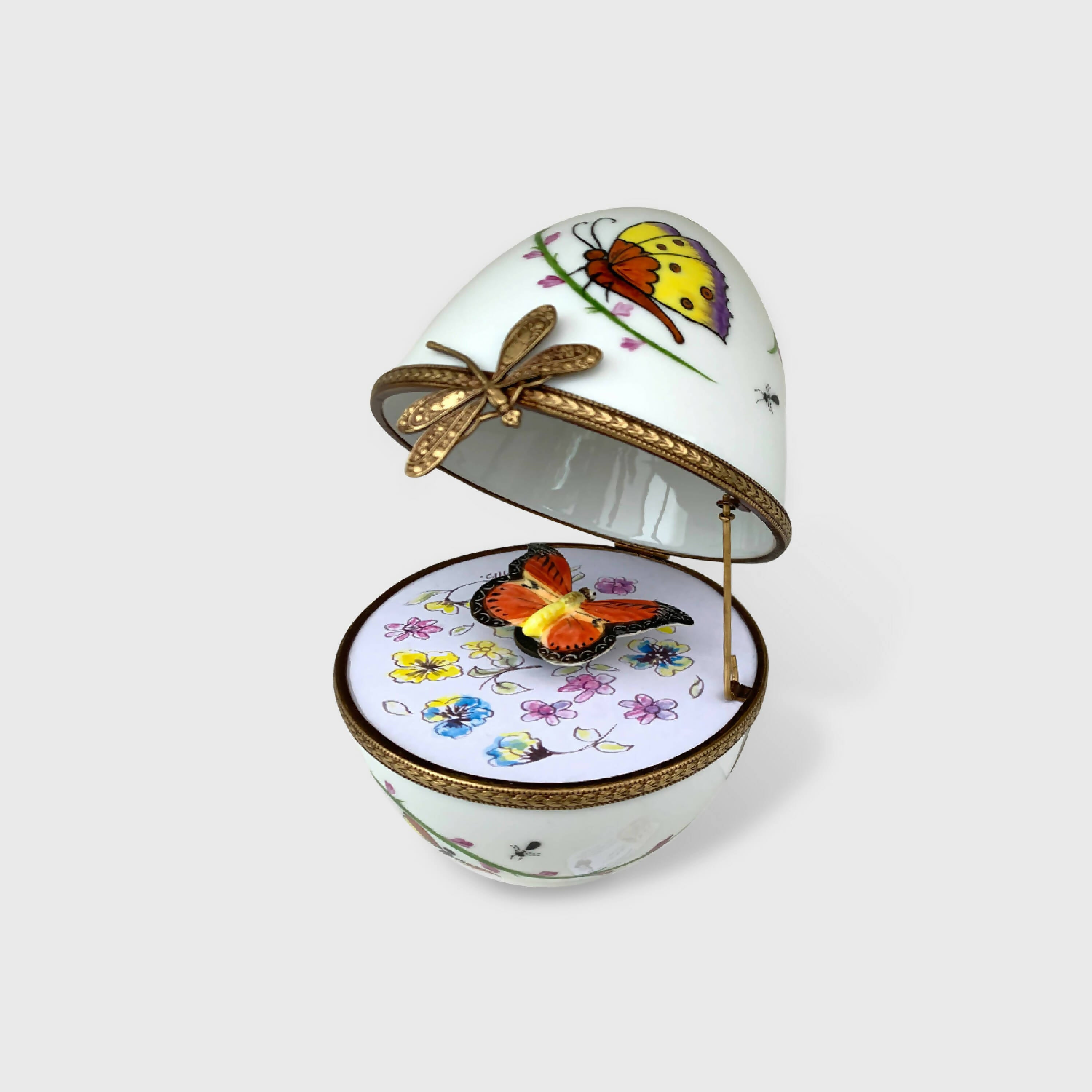 Oeuf musical blanc decor papillon orange | EMPREINTES Paris